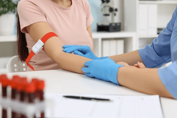 laboratory-testing-doctor-taking-blood-600nw-2440307207